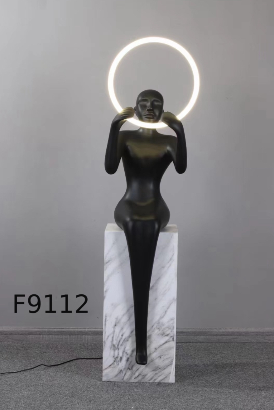 Modern Abstract Sitting Figure LED Ring Sculpture Lamp
