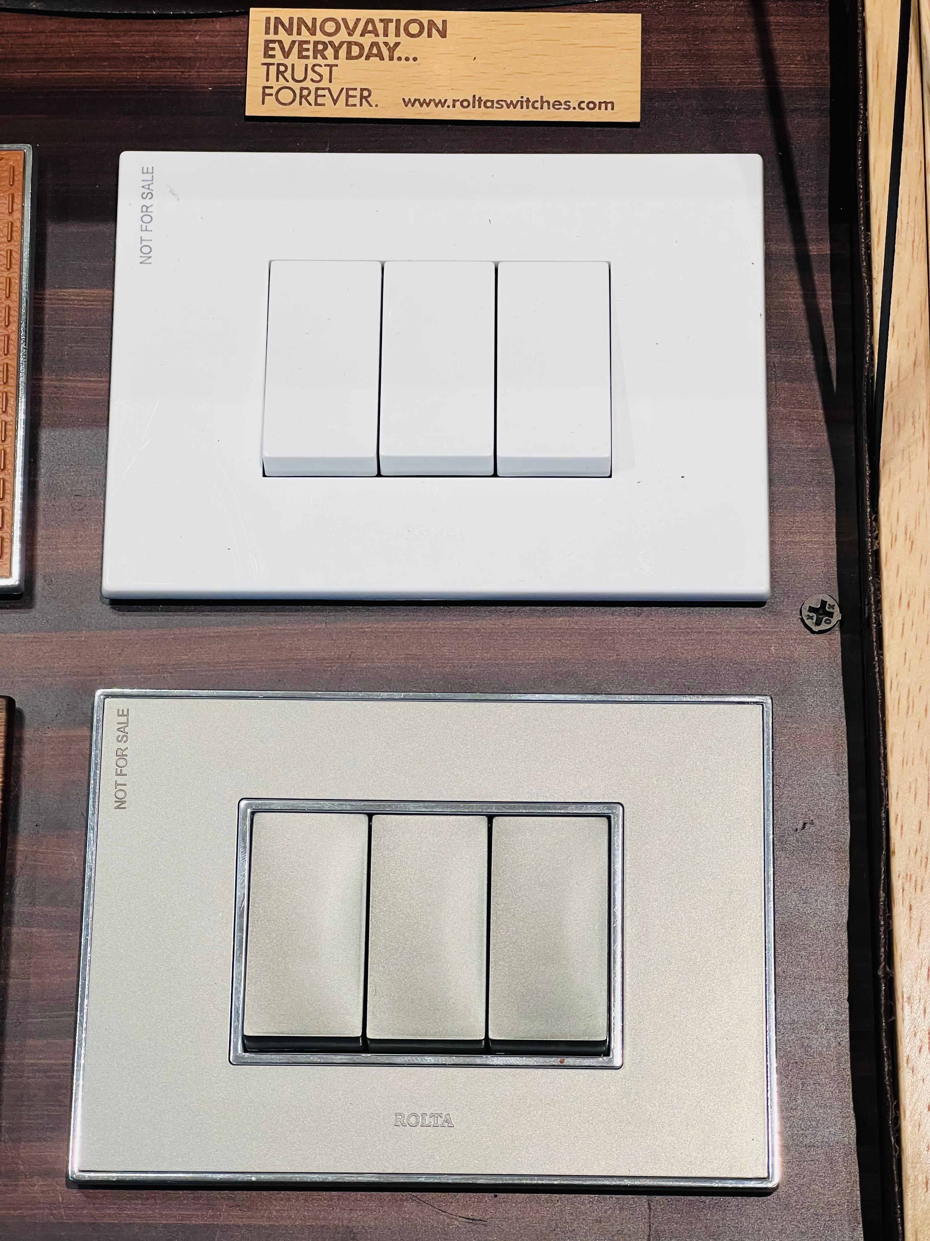 Sophisticated White and Silver Three-Switch Plate