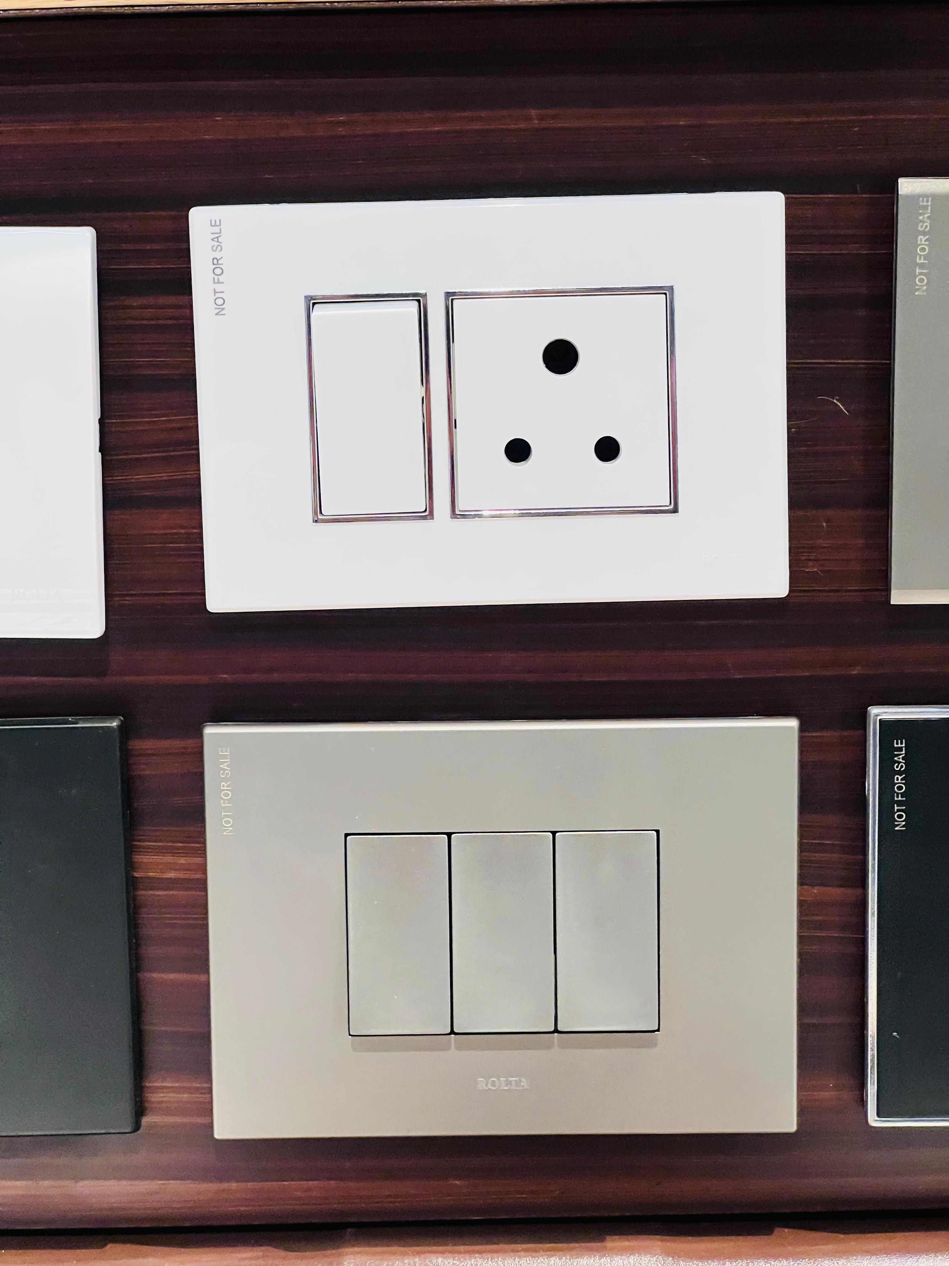 Clean White and Silver Socket Plate